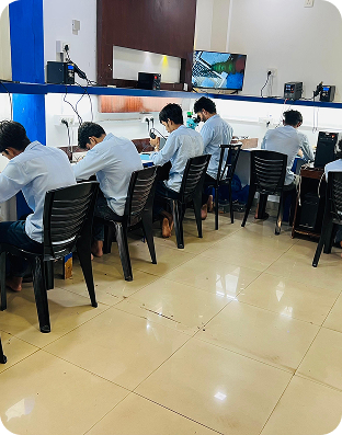 Students learning mobile app development in a classroom