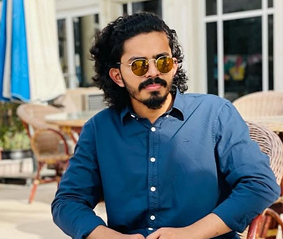 Students learning mobile app development in a classroom