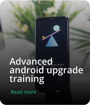 Students learning mobile app development in a classroom