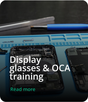 Students learning mobile app development in a classroom